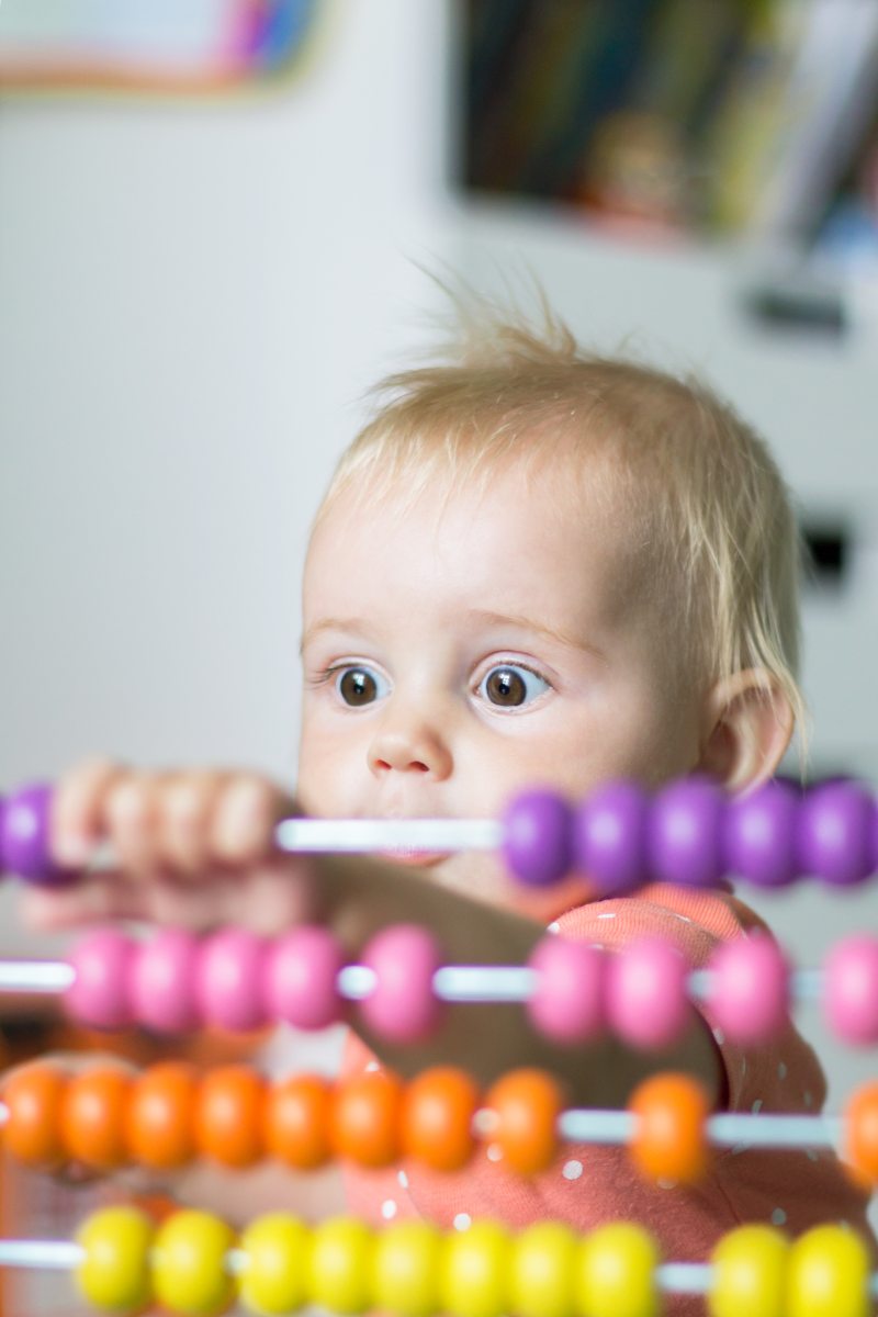 Baby with abacus — referral programme at Feel The Benefit